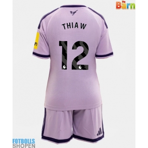 Billiga Newcastle United Malick Thiaw #12 Tredjeställ Barn 2026-27 Kortärmad (+ Korta byxor)